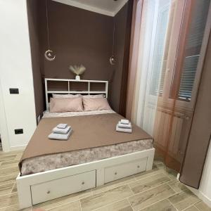 En eller flere senge i et værelse på Casa Rebocco + 5 billeder