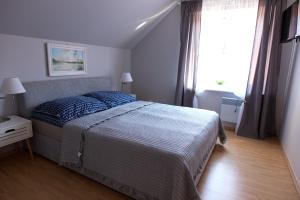 Postel nebo postele na pokoji v ubytování Ośrodek Wypoczynkowy Relaks i Apartamenty