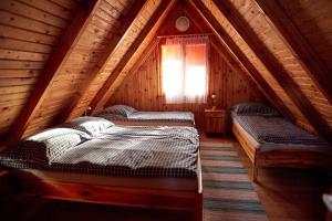 Postel nebo postele na pokoji v ubytování Ośrodek Wypoczynkowy Relaks i Apartamenty