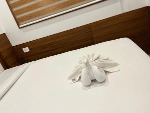 Welcome Hotels客房内的一张或多张床位