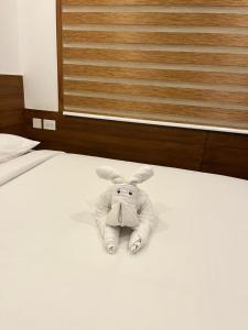 Welcome Hotels客房内的一张或多张床位