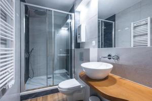 Ванная комната в VacationClub - Podgórzyńska 6A apartament 6 +6 фотографий