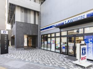 a store front of a building with its doors open at Sotetsu Fresa Inn Hiroshima in Hiroshima
