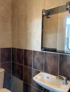 Koupelna v ubytování Hotel Rex