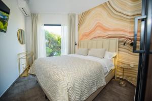 Postel nebo postele na pokoji v ubytování More Medici Apartments
