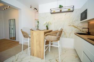 Kuchyň nebo kuchyňský kout v ubytování More Medici Apartments
