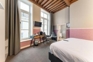TV a/nebo společenská místnost v ubytování Hotel karel de stoute