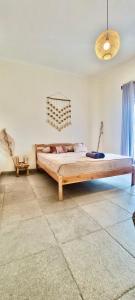 Ліжко або ліжка в номері Sastro Place