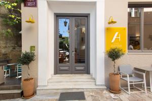The facade or entrance of Athena hotel