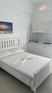 Postel nebo postele na pokoji v ubytování Mimika studios + 10 fotografií