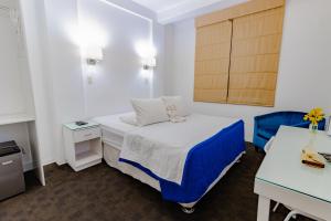 Postel nebo postele na pokoji v ubytování Hotel Gran Palma Piura