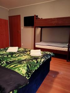 Postel nebo postele na pokoji v ubytování Bursztynowa 2