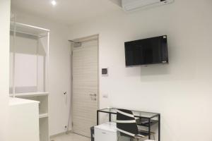 TV a/nebo společenská místnost v ubytování SG Rooms