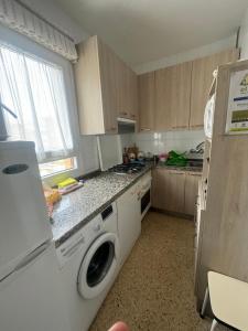 Kuchyň nebo kuchyňský kout v ubytování APARTAMENTO EN LLANES con plaza de garaje cubierta