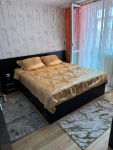 Ένα ή περισσότερα κρεβάτια σε δωμάτιο στο Oana Guest House