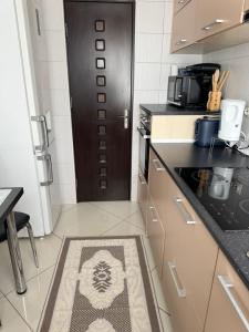 Η κουζίνα ή μικρή κουζίνα στο Oana Guest House