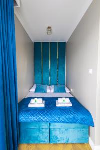 Ένα ή περισσότερα κρεβάτια σε δωμάτιο στο Aparti GoldNWhite Studio GALAXY