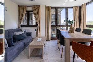 Гостиная зона в Increíbles Vistas A Las Montañas En El Pas De La Casa - Parking - Wifi - Ski in Ski out l by BonesVacances +44 фотографии