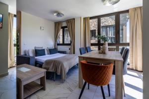 Гостиная зона в Increíbles Vistas A Las Montañas En El Pas De La Casa - Parking - Wifi - Ski in Ski out l by BonesVacances