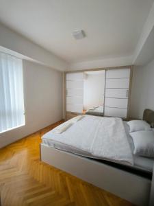 Postel nebo postele na pokoji v ubytování Relax Apartment