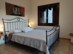 Postel nebo postele na pokoji v ubytování Miression Pelion House