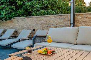Posedenie v ubytovaní Luxury Apartments VilaMaloca