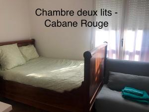 Postel nebo postele na pokoji v ubytování Chambre au coeur du Bassin