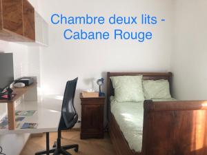 Postel nebo postele na pokoji v ubytování Chambre au coeur du Bassin