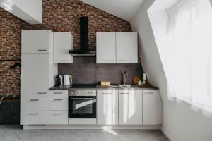 Köök või kööginurk majutusasutuses Loft Schottenau