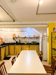Kuchyň nebo kuchyňský kout v ubytování Lamparina Hostel