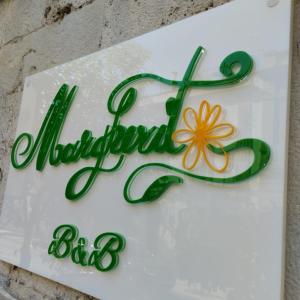 Certifikát, hodnocení, plakát nebo jiný dokument vystavený v ubytování B&B Margherita