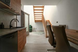 Kuchyň nebo kuchyňský kout v ubytování Enjoy apartments