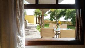 a view of a patio with a table and chairs at Los Padres B in Puerto de Tazacorte