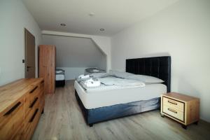 Postel nebo postele na pokoji v ubytování Enjoy apartments