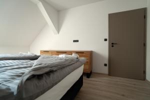 Postel nebo postele na pokoji v ubytování Enjoy apartments