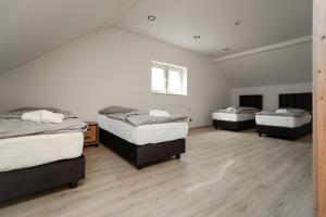 Postel nebo postele na pokoji v ubytování Enjoy apartments