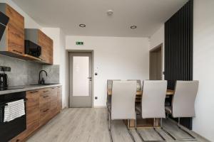 Kuchyň nebo kuchyňský kout v ubytování Enjoy apartments