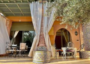 Foto dalla galleria di Palmeraie 5 Vue Piscine et Jardin a Marrakech