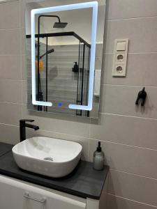 A bathroom at Péterfia Boutique Apartments