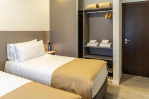 Postel nebo postele na pokoji v ubytování Espacio Terra Apartamentos