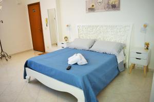 Letto o letti in una camera di Villa Rosi