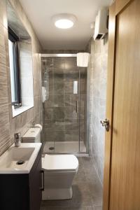 Ванная комната в Pierside Apartments Deluxe Accommodation