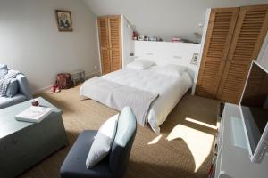 Katil atau katil-katil dalam bilik di Appartement vue port