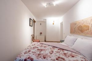 Postel nebo postele na pokoji v ubytování Le Scalette - Holiday Home in Calvi - ItalyWeGo