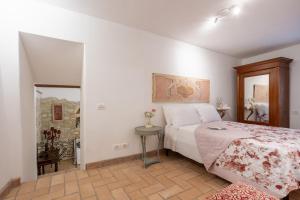 Postel nebo postele na pokoji v ubytování Le Scalette - Holiday Home in Calvi - ItalyWeGo