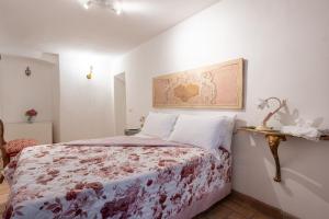Postel nebo postele na pokoji v ubytování Le Scalette - Holiday Home in Calvi - ItalyWeGo