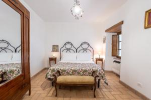 Postel nebo postele na pokoji v ubytování Le Scalette - Holiday Home in Calvi - ItalyWeGo