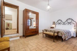 Postel nebo postele na pokoji v ubytování Le Scalette - Holiday Home in Calvi - ItalyWeGo