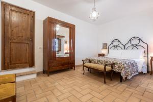Postel nebo postele na pokoji v ubytování Le Scalette - Holiday Home in Calvi - ItalyWeGo