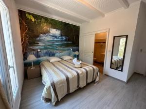 Postel nebo postele na pokoji v ubytování L'hôtel du Bastier